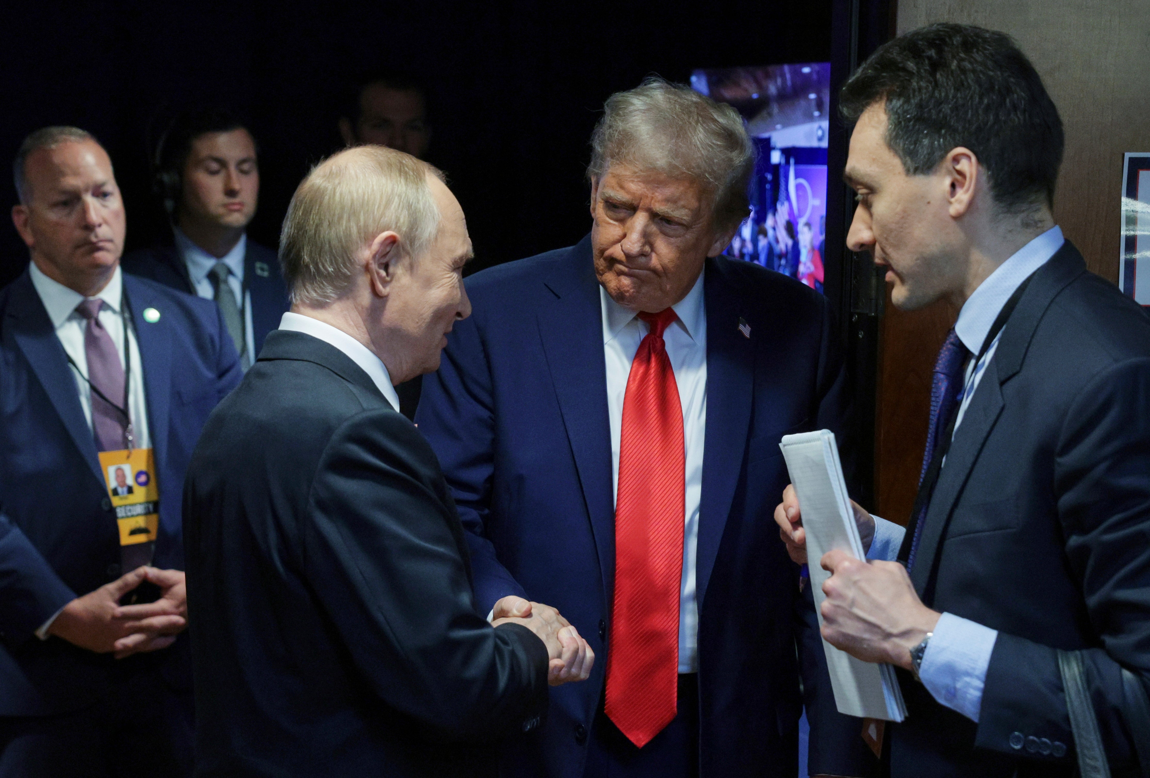 TRUMP-PUTIN-POSTURAS
