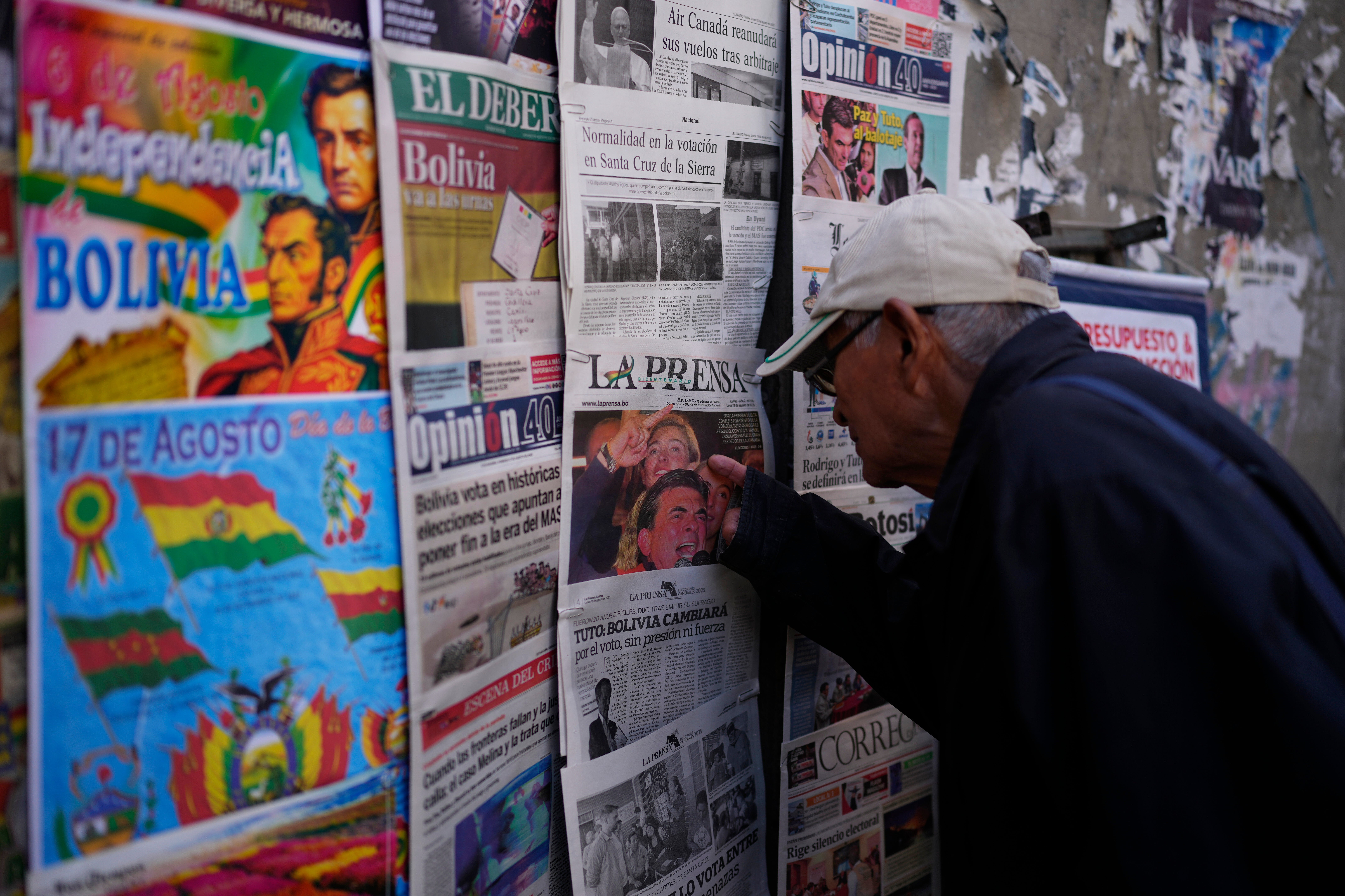 Reformista moderado y derechista defensor del ajuste se verán las caras en el balotaje de Bolivia