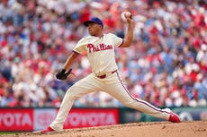 Suárez tiene un récord personal de 11 ponches y los Filis vencen 3-2 a los Nacionales