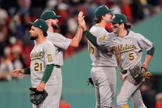 Atléticos superan 2-1 a Medias Rojas que pierden terreno en la Liga Americana