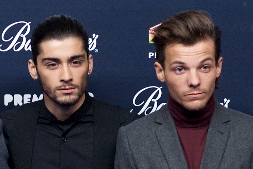 Zayn Malik y Louis Tomlinson con One Direction en Madrid en 2014