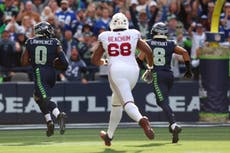 DeMarcus Lawrence logra dos anotaciones defensivas y Seahawks dominan 44-22 a Cardinals