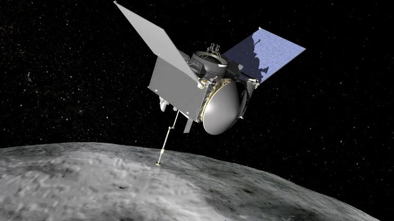 Imagen ilustrativa de la nave OSIRIS-REx sobrevolando el antiguo asteroide Bennu Muestras del asteroide revelaron azúcares ocultos que son esenciales para la vida en la Tierra