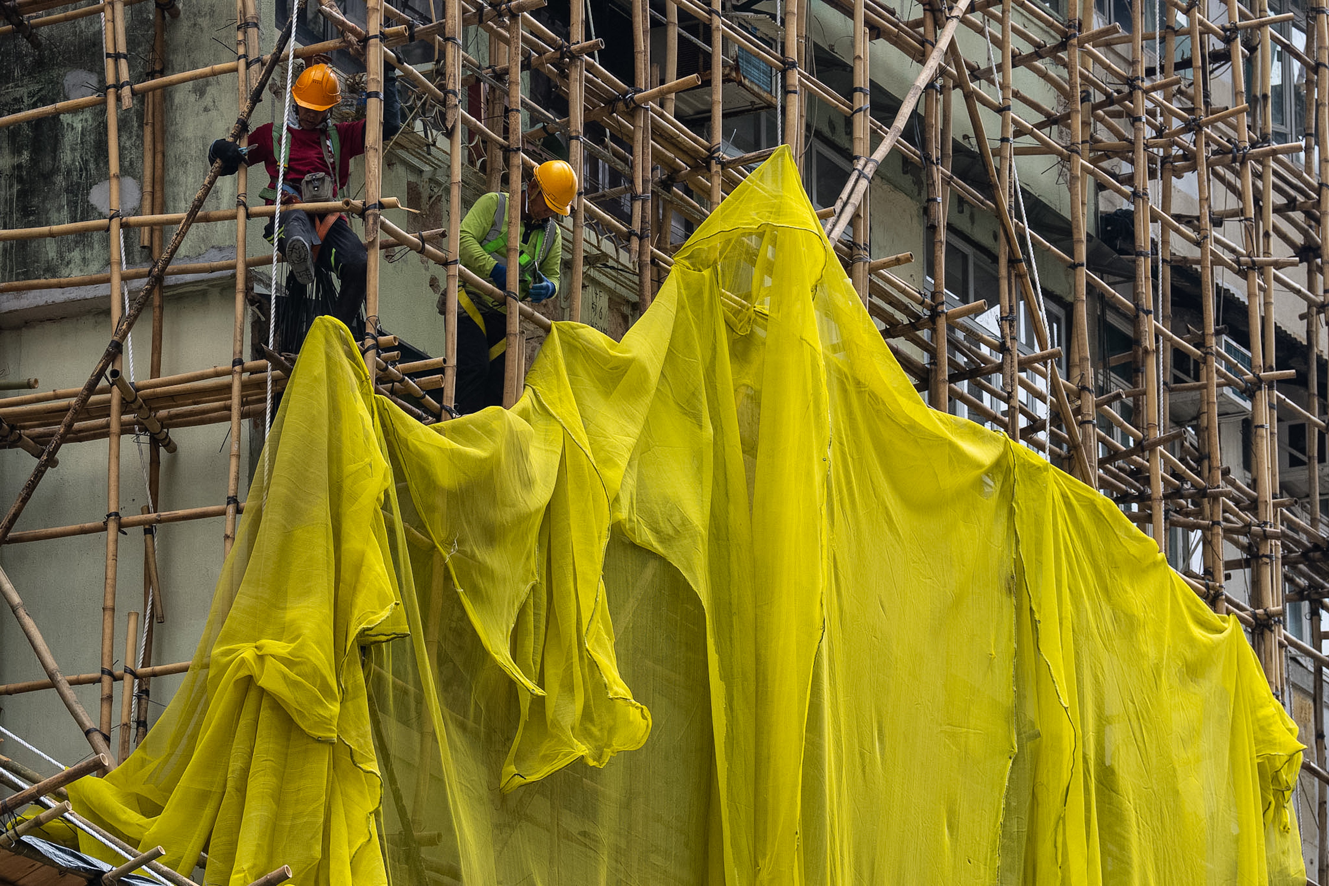 AP EXPLICA-HONG KONG-INCENDIO-ANDAMIOS