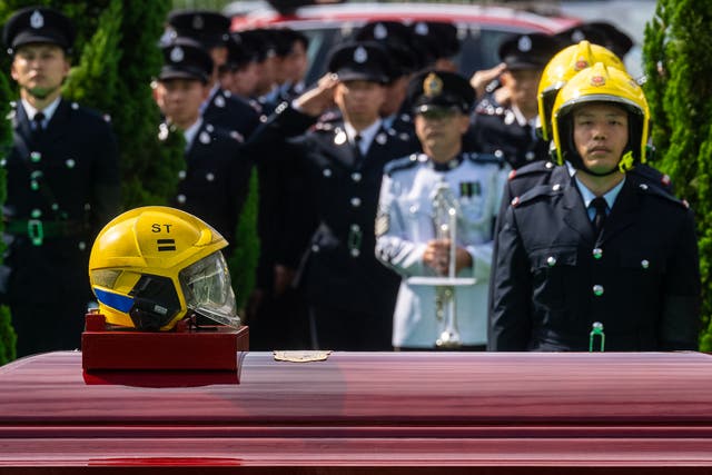 HONG KONG-INCENDIO-BOMBERO-FUNERAL