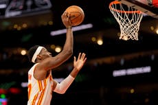 Hawks remontan y vencen 110-103 a Suns, que pierden a Booker por lesión