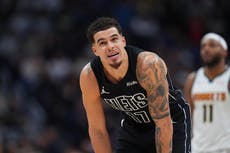 Murray logra 27 puntos y Nuggets vencen 107-103 a Nets en el regreso de Porter a Denver