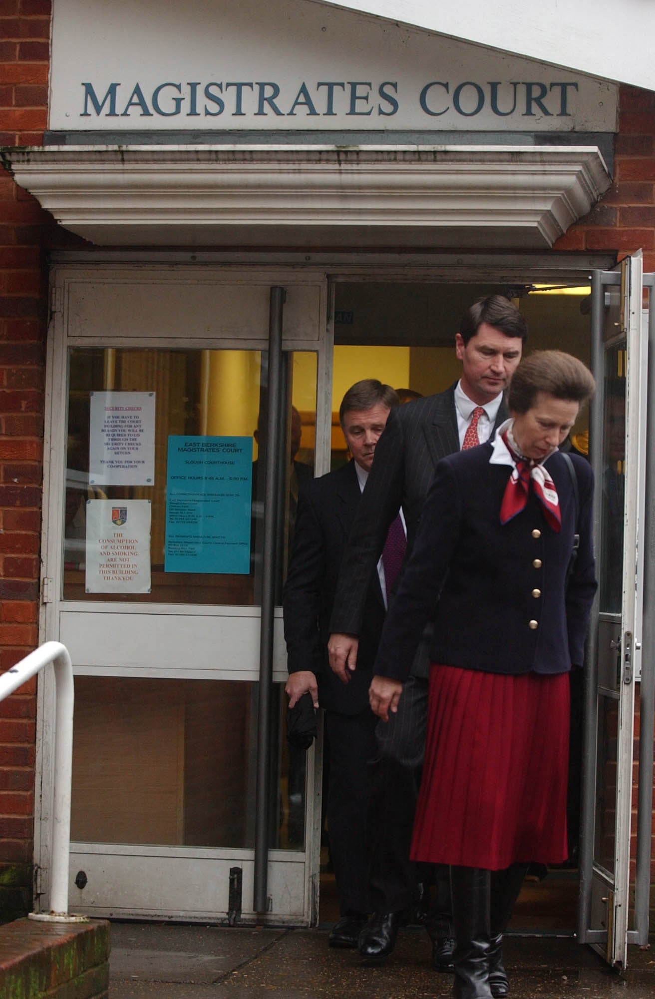 Anne and her husband, the then-Commander Tim Laurence, leave East Berkshire Magistrates’ Court in Slough, after she admitted a charge under the Dangerous Dogs Act in 2002 (Toby Melville/PA)