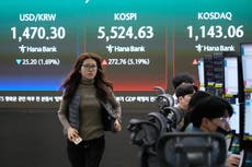 Las acciones asiáticas remontan tras el repunte en Wall Street y el petróleo baja a unos 90 dólares