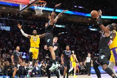 Doncic anota 60 y LeBron consigue récord mientras Lakers vencen al Heat