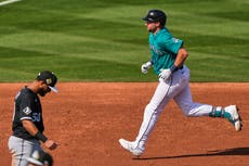 Cal Raleigh y los Marineros buscan defender su primer título desde 2001