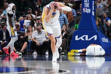Warriors vencen 137-131 a Dallas en prórroga; Moses Moody sale en camilla
