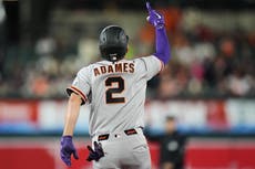 Jonrones de Adames y Lee respaldan sólido inicio de Roupp; Gigantes vencen 6-3 a Orioles