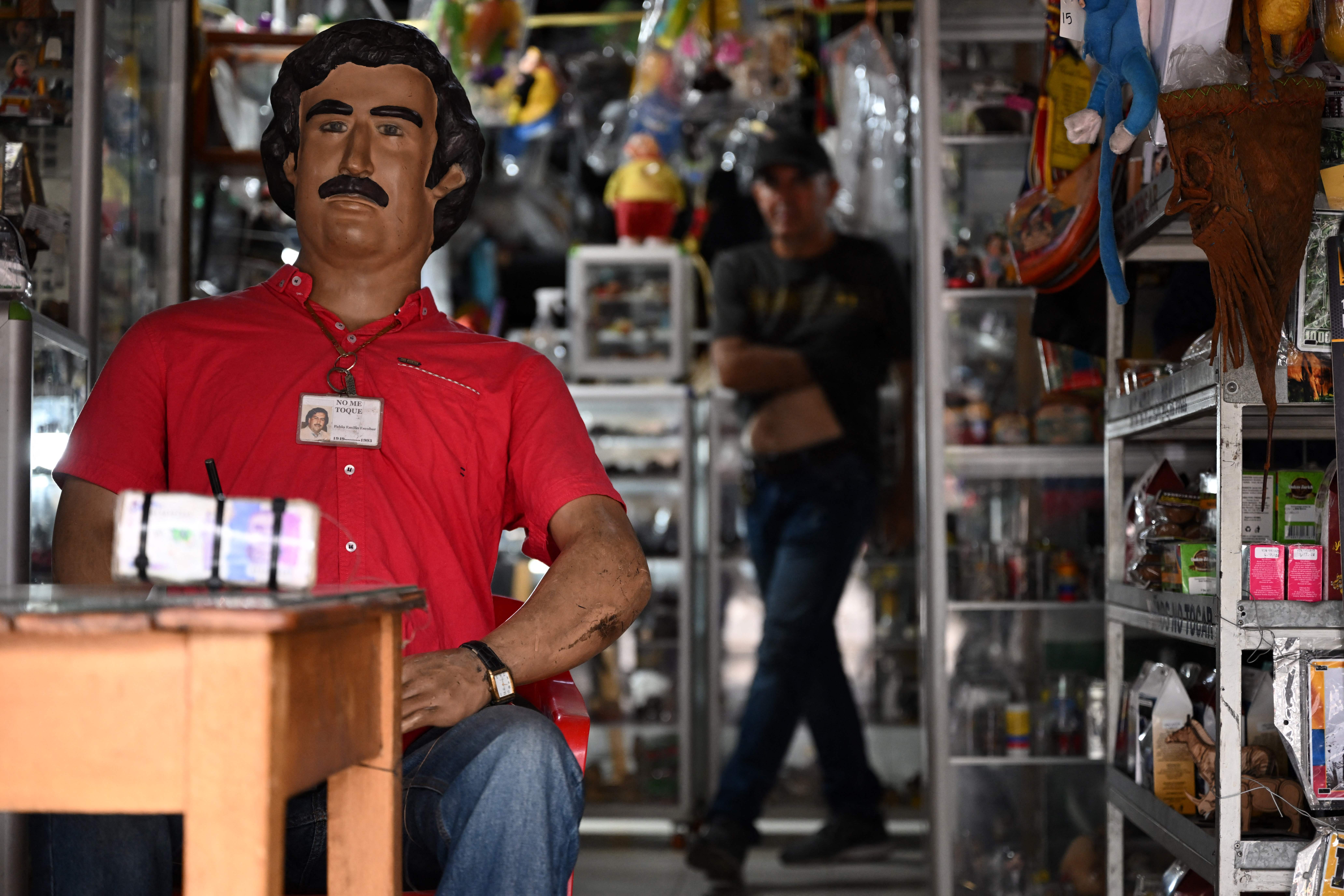 A dummy depicting the deceased drug lord Pablo Escobar is seen at the "Pablo Escobar" shop in Doradal, Antioquia department, Colombi