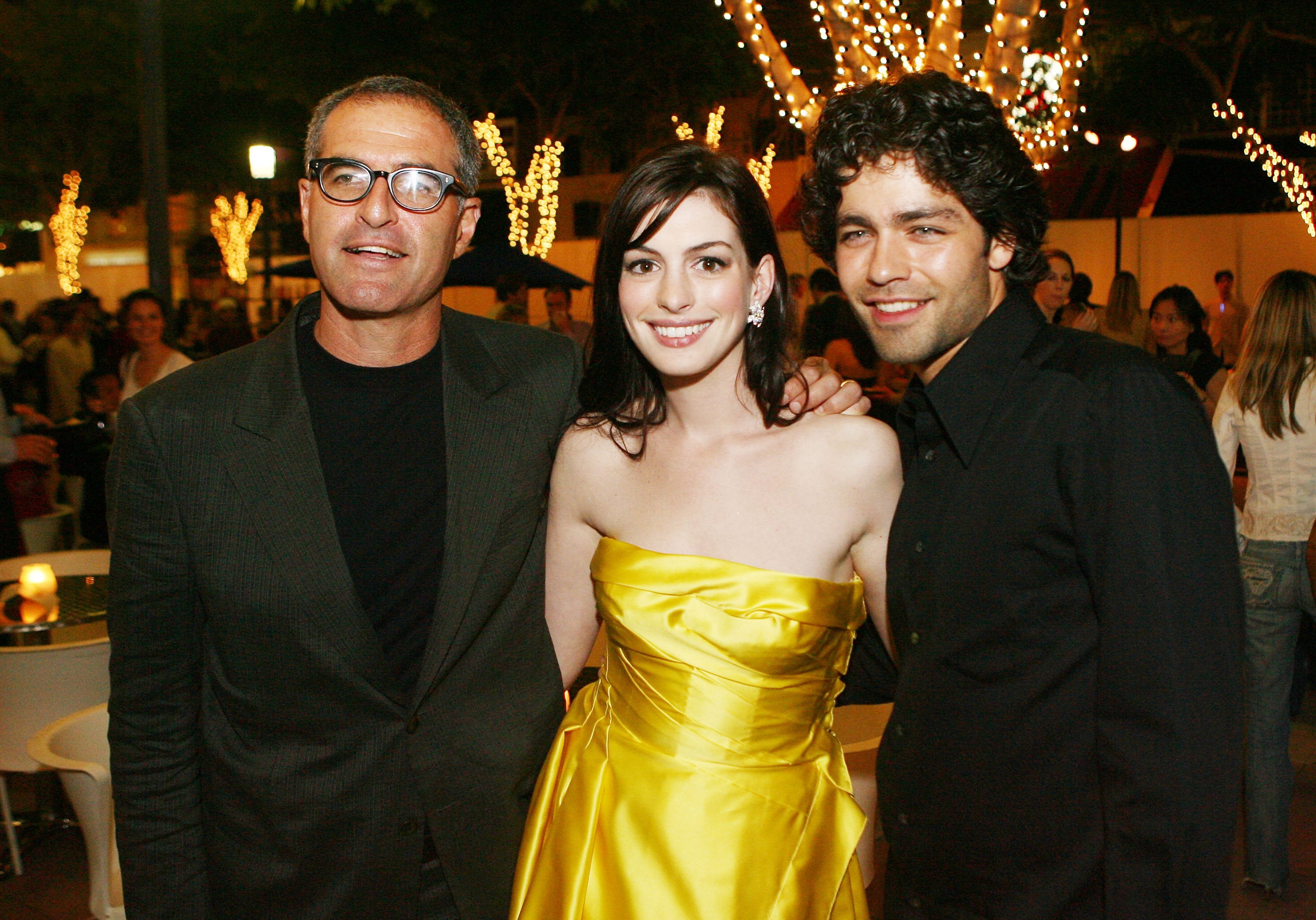 Hathaway (dazzling, brilliant) and Adrian Grenier (straight, evil) attend a ‘Devil Wears Prada’ event in 2006