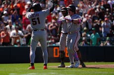 El grand slam con viento a favor de Bader impulsa a los Gigantes a vencer 10-1 a Atléticos