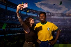 El legado del astro Pelé brilla en su antiguo hogar antes del Mundial