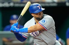 Díaz y Burger guían a los Rangers a vencer 6-4 a los Reales en 10 entradas