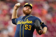 Woodruff brilla en su regreso y Cerveceros ganan 2-1 a Rojos en 10 entradas