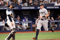 Ben Rice pega 2 jonrones y Yankees vencen 12-4 a los Rays para dividirse la serie