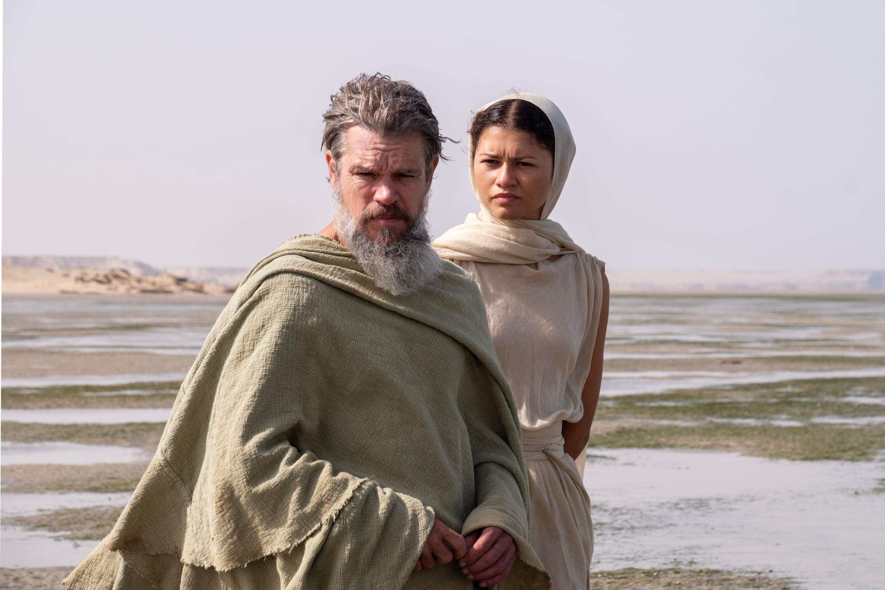 Matt Damon como Odiseo y Zendaya como Atenea