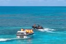 Filipinas acusa a guardacostas chinos de herir a un marinero en un bajío en disputa