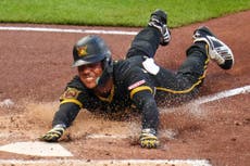 Lowe y Flores conectan jonrones y los Piratas vencen 8-4 a los Medias Rojas en mala racha