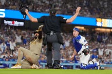 Machado castiga a los Dodgers y los Padres toman en solitario el primer comodín