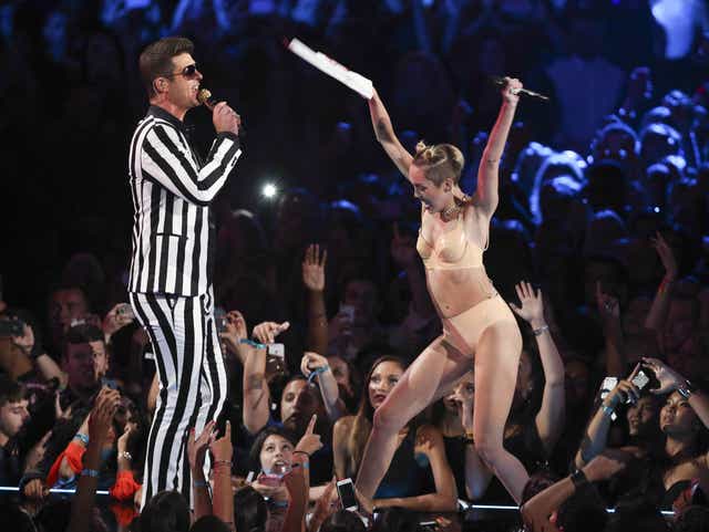 <p>Miley Cyrus or Robin Thicke

<p>Bad replicas of Miley’s snazzy VMA apparel are all over online shopping costume outlets at the moment. But should you venture into the realm of post-Disney princess for Halloween, bear in mind that the sheer fear of rewitnessing Miley-style twerking might send your fellow party-goers in the opposition direction.</p>

<p>Of new contentious costumes for Halloween 2013, dressing up as Robin Thicke comes in at no.1. Famous for that song with questionable lyrics, gyrating against Miley Cyrus, and not much else, people might start to wonder why you decided to impersonate the man.</p></p>