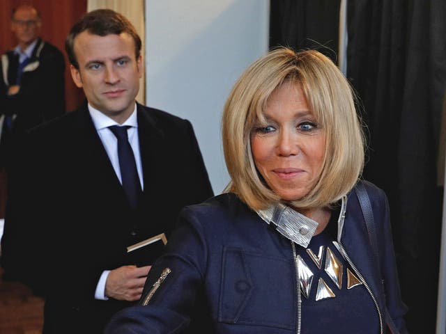 Emmanuel Macron and wife Brigitte Trogneux arrive in Washington