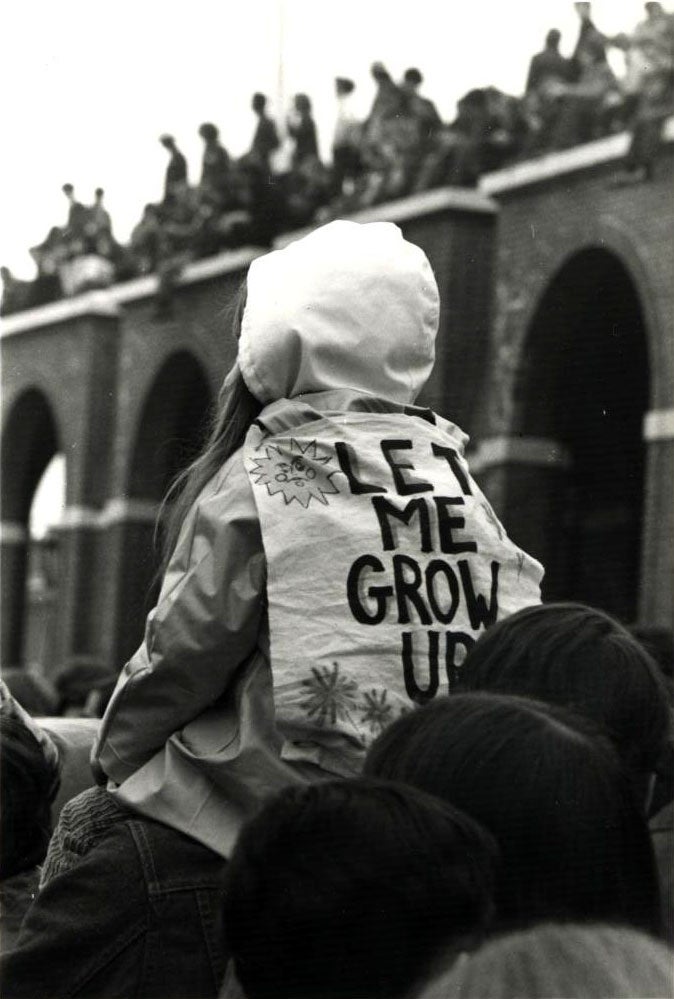 A member of the audience on the eve of Earth Day